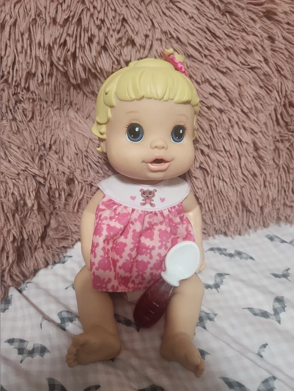 Hasbro Baby Alive Make Me Better baby doll with blonde hair